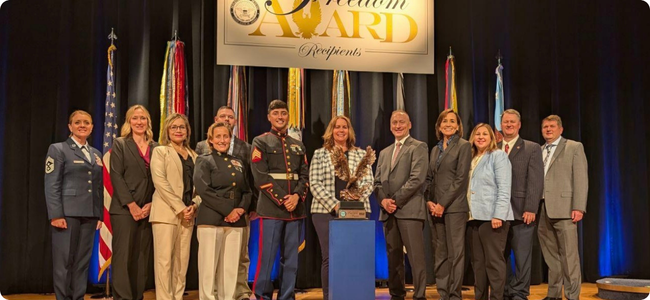 Group photo of TEP accepting their award