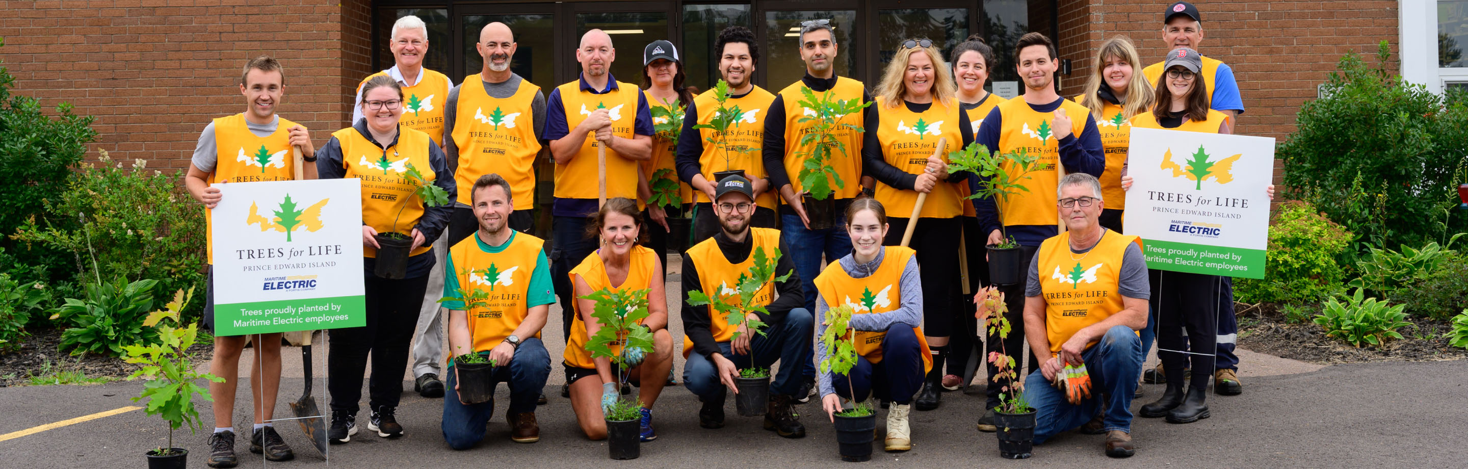 Community group photo for Trees for Life initiative. 