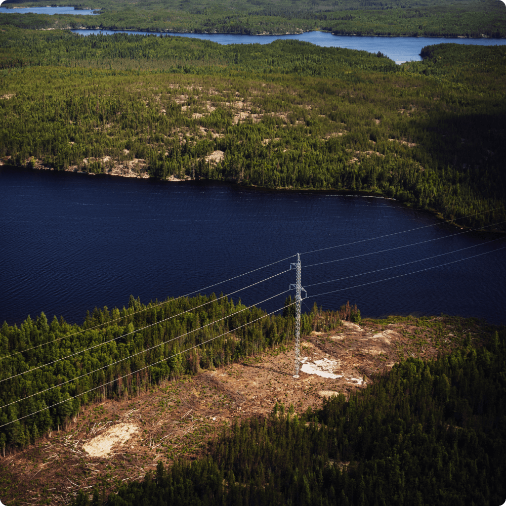 Large bodies of water and land with power lines