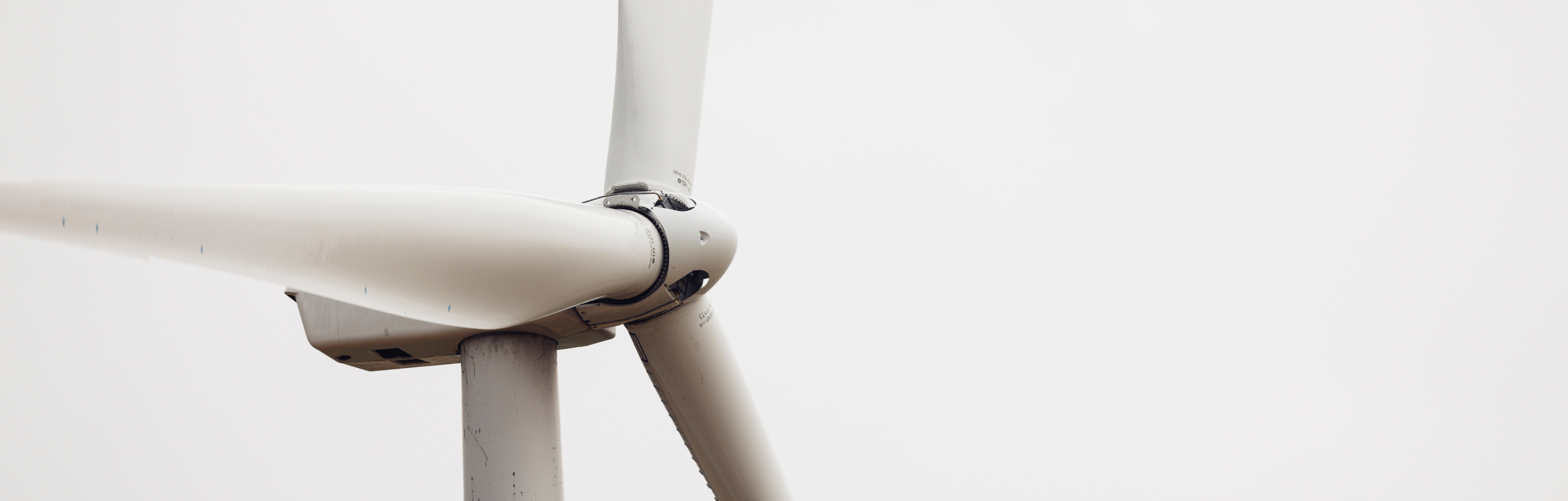 Wind turbine with a grey background