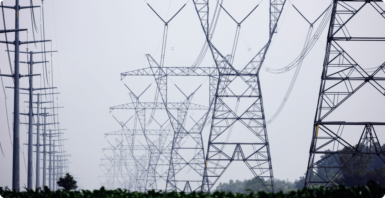 Transmission towers and power lines in a linear line